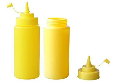 Nahrungsmittelgrad-Gelbbedecken Plastiksoßenflaschen mit Soße mit einer Kappe, drücken Soßenflasche zusammen